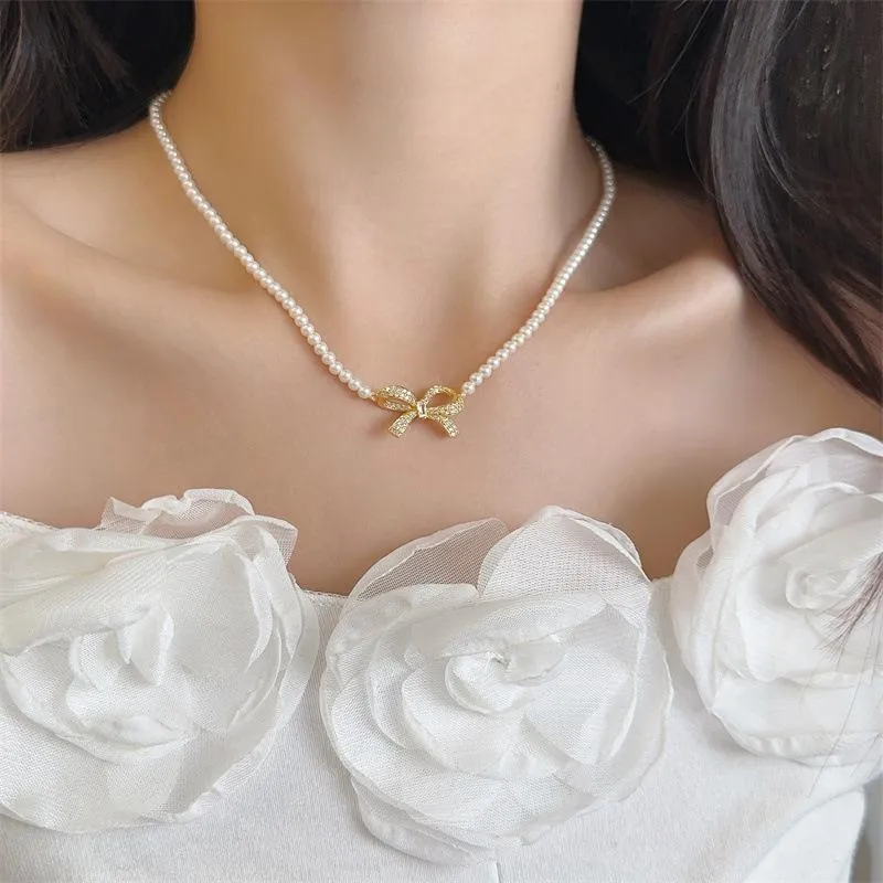 Bow Shape Pearl Korean Necklace (PQT-992)