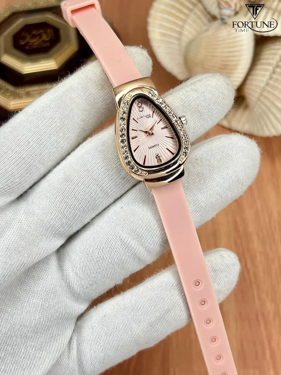 Women's Movement: Quartz, Water Resistant Watch.