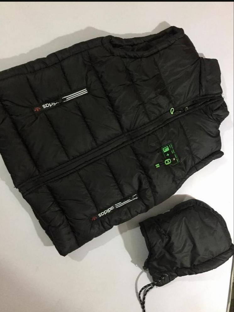 Black Sleeveless Puffer Jacket with Green Logo Medium to XL