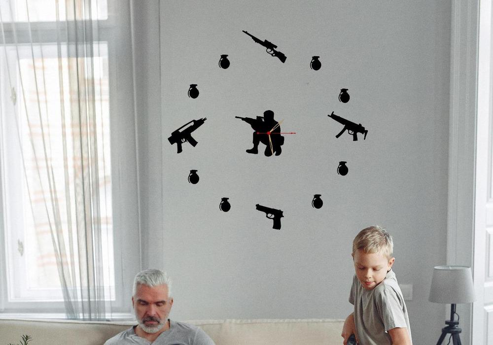 Guns and Bombs Wooden Wall Clock
