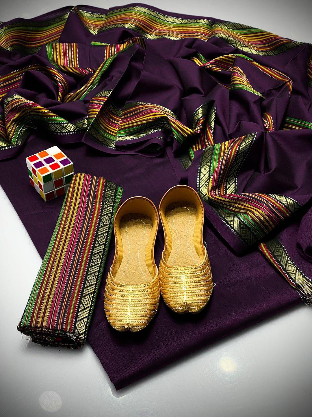 4 Pcs Women's Unstitched Jacquard Plain Suit With Khussa